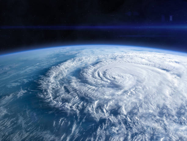 Planet Earth in the space. Blue Earth in the space. Hurricane seen from the space over planet Earth. Storm, hurricane, typhoon - concept cataclysm. Elements of this image furnished by NASA.______ Url(s): https://photojournal.jpl.nasa.gov/catalog/PIA17257   https://www.nasa.gov/image-feature/hurricane-florence-as-it-was-making-landfall-0 hurricane stock pictures, royalty-free photos & images