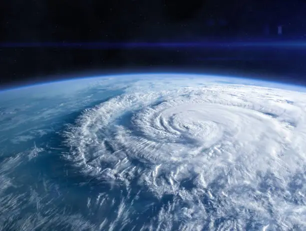 Blue Earth in the space. Hurricane seen from the space over planet Earth. Storm, hurricane, typhoon - concept cataclysm. Elements of this image furnished by NASA.______ Url(s): https://photojournal.jpl.nasa.gov/catalog/PIA17257   https://www.nasa.gov/image-feature/hurricane-florence-as-it-was-making-landfall-0