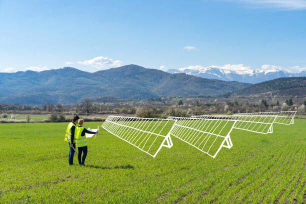 istock Two engineers envisage a future solar photovoltaic farm 1527906692