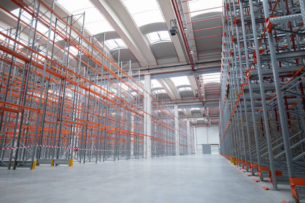 istock Empty warehouse in a modern factory 1527923284