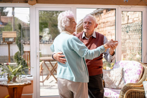 istock An silver-haired couple dancing in their lounge during isolation 1527928782