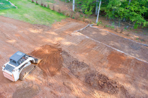 istock When preparing an area for construction, a tractor is used to move earth 1527941927