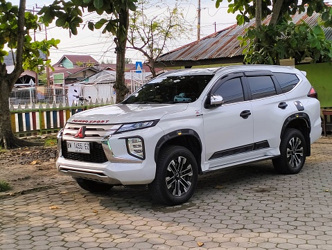 indonesia, june 29th 2023 : new Pajero sport at school yard