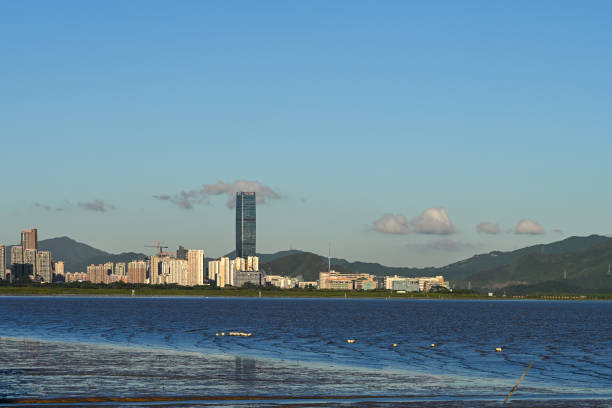 istock Seaside Sunset and Buildings 1527951464