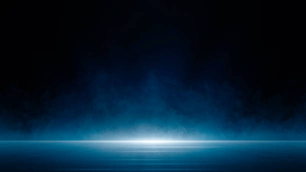 istock Stage shows, Dark blue background, an empty dark scene, laser beams, neon, spotlights reflecting on the asphalt floor, and a studio room with smoke floating up, a night view of the street, the city 1527959939