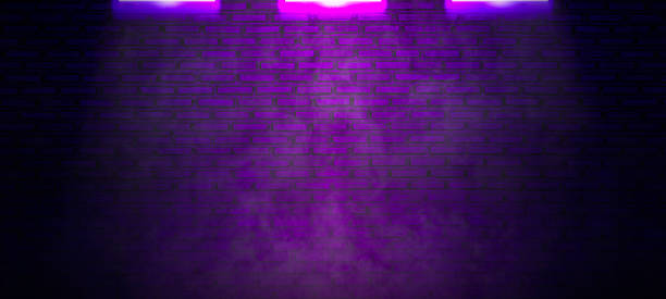 istock Brick wall texture pattern, blue, and purple background, an empty dark scene, laser beams, neon, spotlights reflection on the floor, and a studio room with smoke floating up for display products. 1527959968