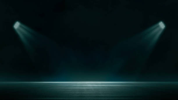 istock Dark stage shows, blue background, an empty dark scene, laser beams, neon, spotlights reflection on the asphalt floor, studio room with smoke floating up for display products. 1527959979