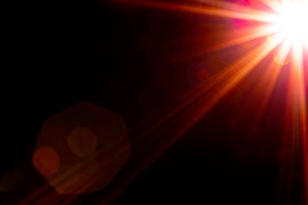 istock Blurred image Sun flare on the black background 1527962038