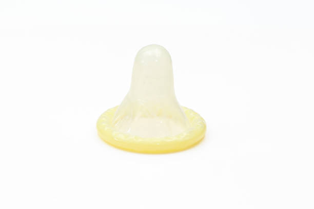 istock Single rubber condom isolated on white background. Contraception 1528006294