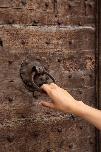 Knocking on wooden old door
