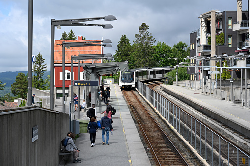 Oslo, Norway, July 5, 2023 - A line 1 subway (T-Bane) heading towards Bergkristallen at Holmenkollen station, Oslo, Norway.