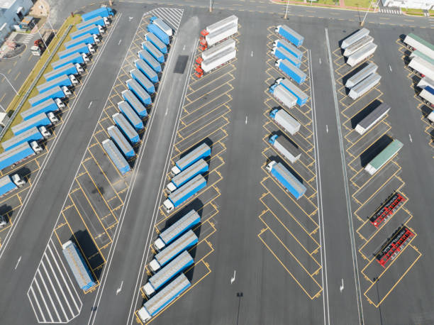 istock Container transport trucks in the parking lot 1528052603