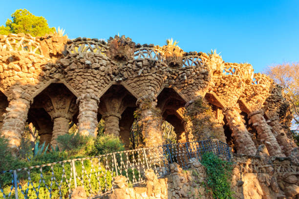 istock Columns designed by Antoni Gaudi in park Guell in Barcelona, Spain 1528056394