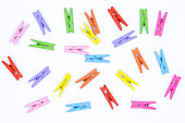 Multi colored clothes-pegs on white background, Clothes clip