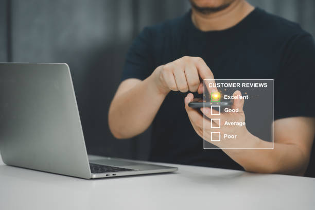 istock Users giving ratings to service experiences on an online website for customer review, satisfaction. Customer review good rating concept 1528072624