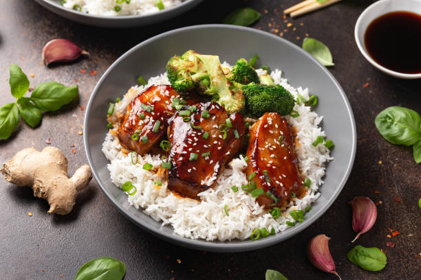 istock Teriyaki Pork Belly with broccoli, spring onion and rice 1528074204