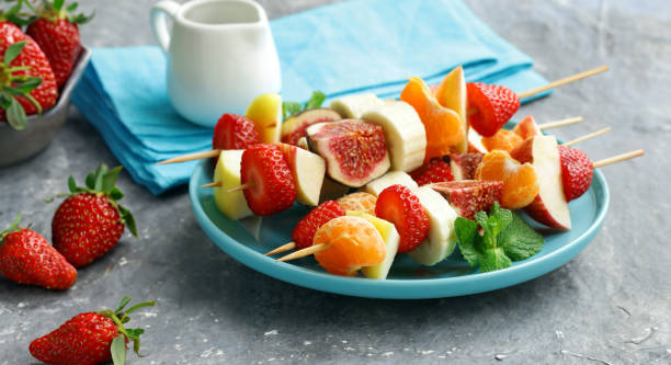 istock fruit salad with fresh berries and fruits 1528096323