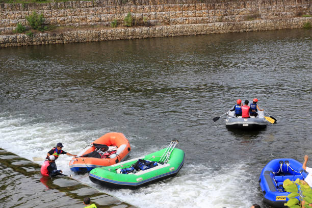 2023-07-01:Lampang Thailand:Tourists are kayaking Cruise along the river at a dam.