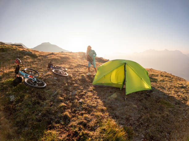istock Woman bikepacking and camping 1528141349