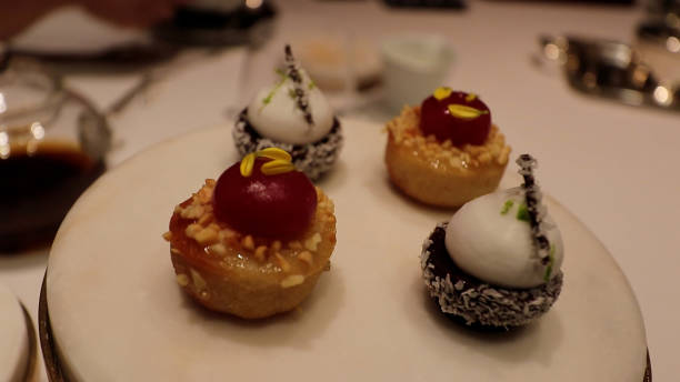istock Petit fours, different types of cakes. 1528184818