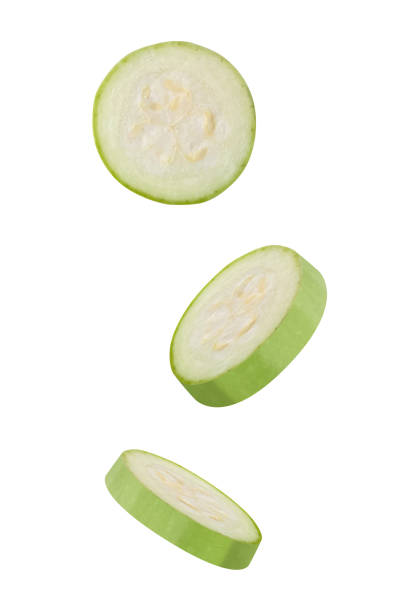 istock Flying marrow zucchini slices isolated on white background. Falling pieces of marrow vegetable. Can be used for advertising, packaging, banner, poster, print. Realistic 3d vector 1528247639