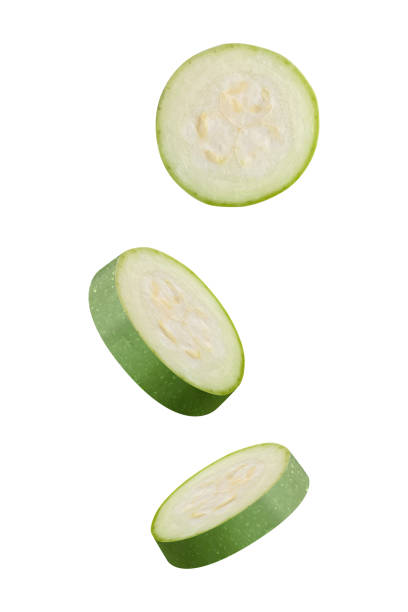 istock Flying marrow zucchini slices isolated on white background. Falling pieces of marrow vegetable. Can be used for advertising, packaging, banner, poster, print. Realistic 3d vector 1528247654