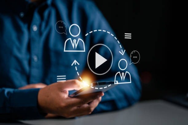 istock touching smartphone to use multimedia technology. thumbnail system laptop information hud showing. 1528361545