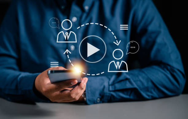 istock touching smartphone to use multimedia technology. thumbnail system laptop information hud showing. 1528361547