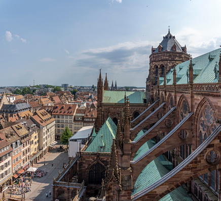 Strasbourg, France - 06 26 2023: Strasbourg cathedral: View of the roof of the cathedral and the city around from the staircase