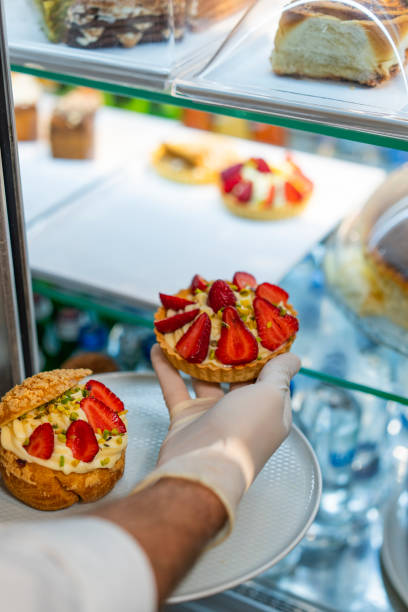 istock Freshly made strawberry pies heading for the fridge 1528383810