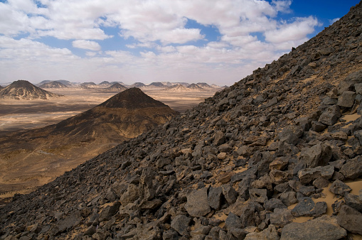 Wild Black Desert made of Egyptian Basalt view from a hill - Baariya - Egypt