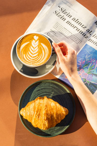 istock A simple breakfast; croissants , coffee and newspaper 1528408272