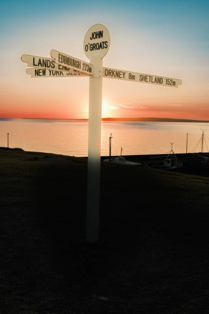istock John o’Groats sign post, Scotland, at sunset in June 1528414573