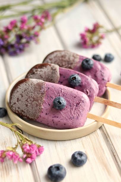 Homemade ice cream with berries and chocolate.