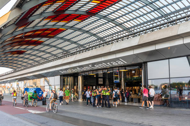 Amsterdam, The Netherlands - July 8th 2023: Entrance of Amsterdam Central Railways station IJ-side