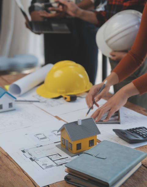 istock Engineer Teamwork Meeting, Drawing working on blueprint meeting for project working with partner on model building and engineering tools in working site, Construction and structure concept. 1528476167