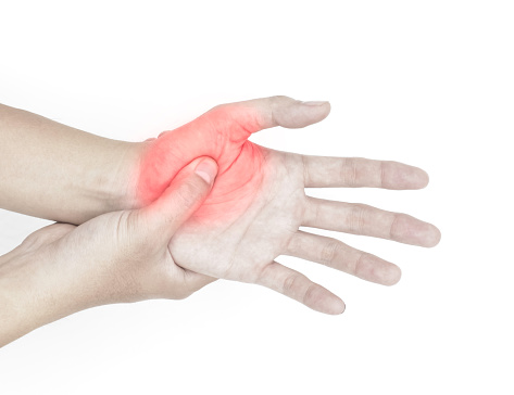 Throbbing pain in palm of Asian young man with diabetes. Concept of cellulitis.
 Isolated on white.