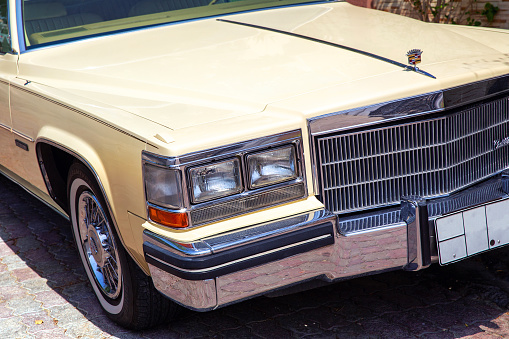Miami, USA - May 27, 2023: Retro car Cadillac Fleetwood Brougham on the street