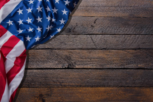 istock USA flag on wood background. 1528600798