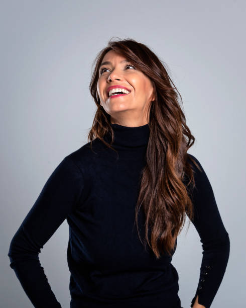 istock Attractive mid aged woman cheerful smiling against isolated background 1528620028