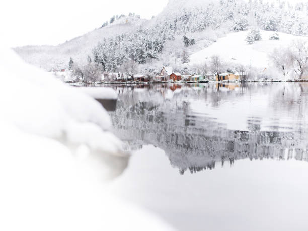 istock lakeside cottages in snowy winter landscape 1528732626