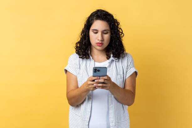 istock Woman using smart phone, typing, answering messages, chatting in social networks. 1528743725