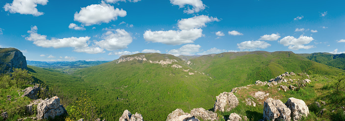 Spring Crimea Mountain country panorama with valley and Sokolinoje Village, Ukraine. Great Crimean Canyon environs.