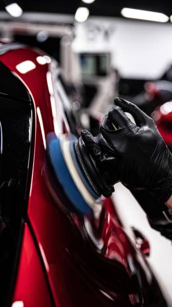 istock Electric machine paint correction in a car detailing studio 1528859616