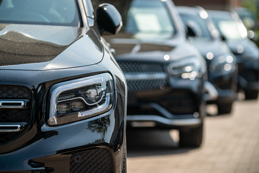 Hamburg, Germany - July 9. 2023: A row of Mercedes SUVs at a car dealership on the outskirts of Hamburg - Germany