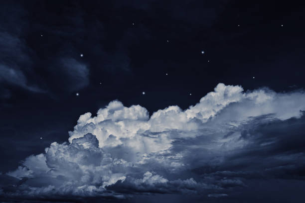 black dark blue night sky with clouds and stars. a storm is coming, thunder, rain. lightning flashes. dramatic. - clear sky flash imagens e fotografias de stock