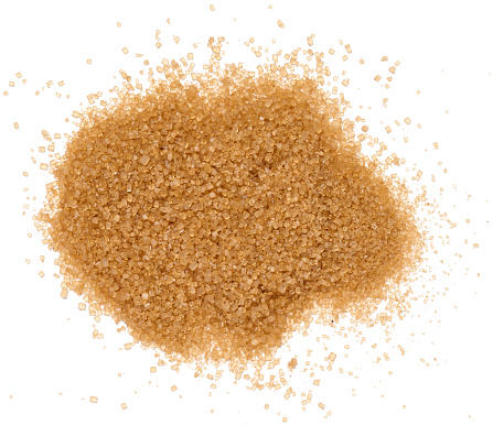 A pile of granulated brown cane sugar, top view