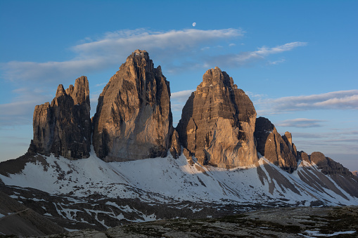 Tre Cime (Drei Zinnen) mountain in the rays of morning sun. Sudtyrol, Italy