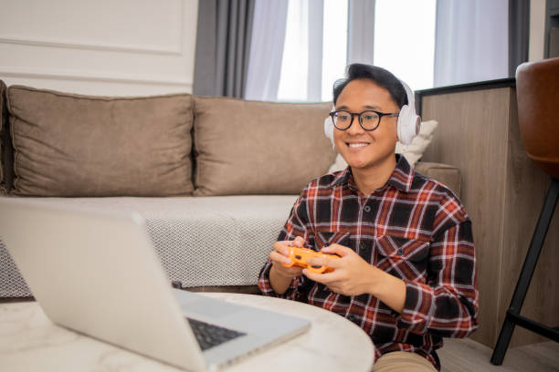 istock Young gamer playing esports 1529121613
