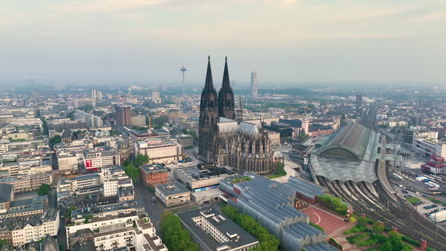 4k Aerial view of cityscape of Cologne, Germany, Europe. Cathedral Church of Saint Peter in historic city center